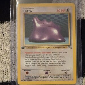 Ditto 1st Edition non-holographic Pokémon trading card from the 1999 Fossil set.